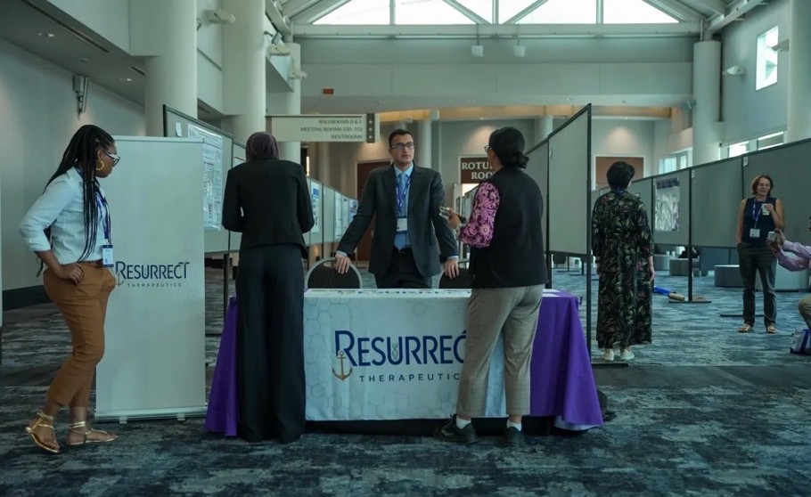 Dunkin’ gift cards at the Resurrect Therapeutics table during the 2026 WIN Symposium